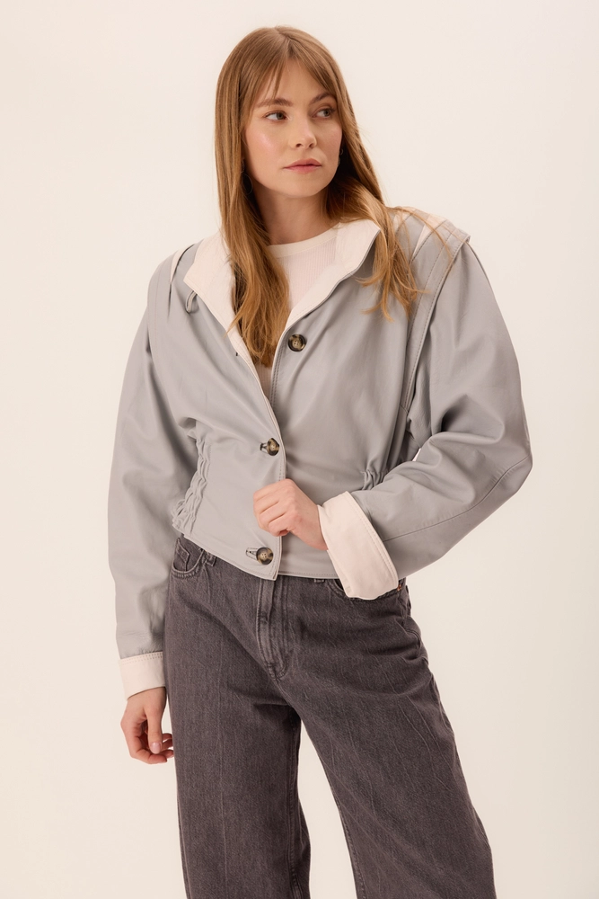 BLUE FITTED LEATHER JACKET WITH WHITE ELEMENTS