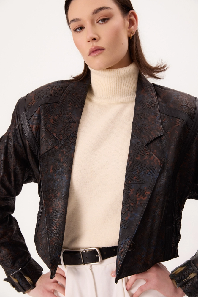 BLACK LEATHER JACKET WITH VINTAGE EMBOSSMENT