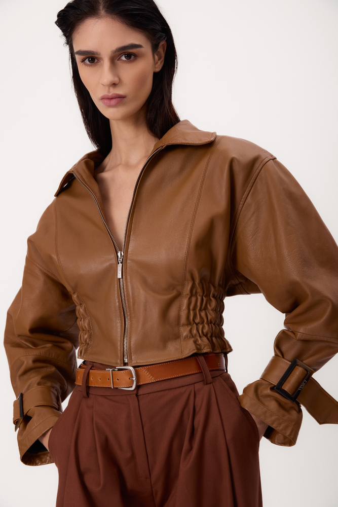 SHORT BROWN ADJUSTABLE WAIST PETITE LEATHER JACKET WITH ZIPPER AND BUCKLES