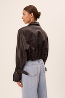 SHORT BLACK LEATHER JACKET WITH DECORATIVE BUCKLES IN CUT No5
