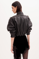 BLACK SHORT LEATHER JACKET WITH A DECORATIVE PATTERN