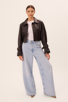 SHORT BLACK LEATHER JACKET WITH DECORATIVE BUCKLES IN CUT No5