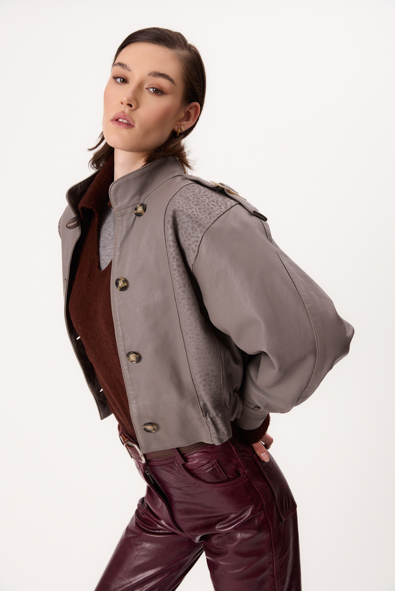 GRAY LEATHER JACKET WITH A DECORATIVE PATTERN