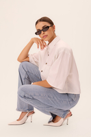 WHITE SHORT OVERSIZED SHIRT WITH A DELICATE CHECKERED PATTERN WITH WIDE DETACHABLE SHOULDER