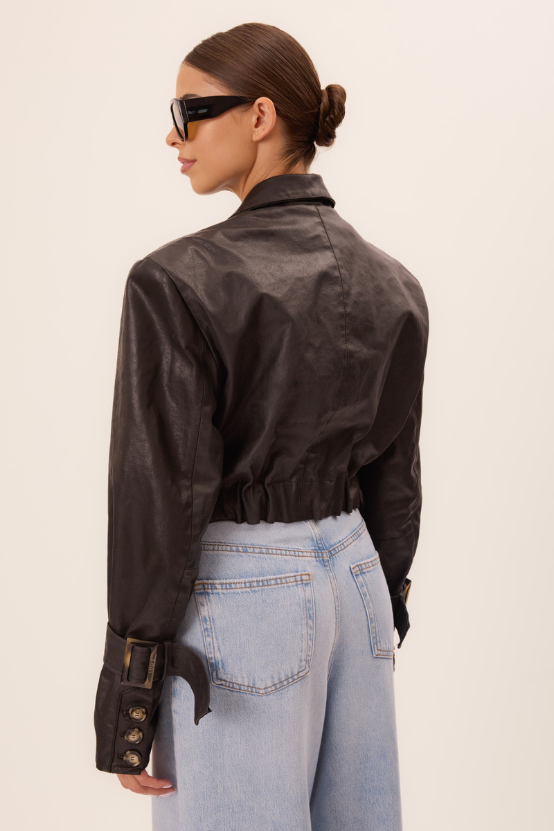 BLACK LEATHER JACKET WITH DECORATIVE BUCKLES IN CUT No5