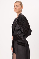 BLACK LEATHER FITTED COAT WITH DECORATIVE VELVET INSERTS
