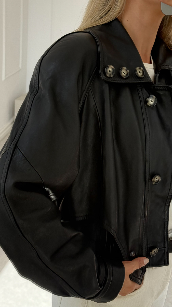BLACK SHORT WAISTED LEATHER JACKET WITH HIGH COLLAR